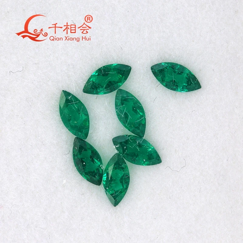 small melee size marquise shape green  Created Hydrothermal Muzo Emerald including minor cracks and inclusions loose gemstone