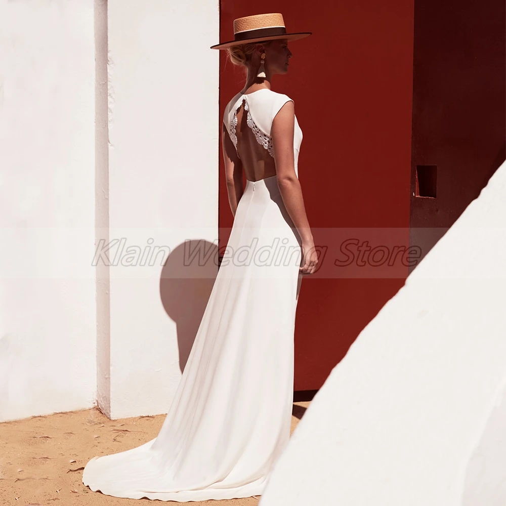 Customized Bohemian Sleeveless Jersey Wedding Dress With Sweep Train Ladies V Neck Backless Bridal Gowns Lace And Buttons Custo