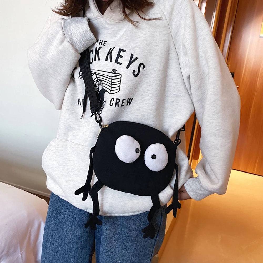 New Cartoon Big-eyed Monster Women\'s Bag Small Messenger Bag Unisex Black Canvas Shoulder Bag Telescopic shoulder strap Handbags