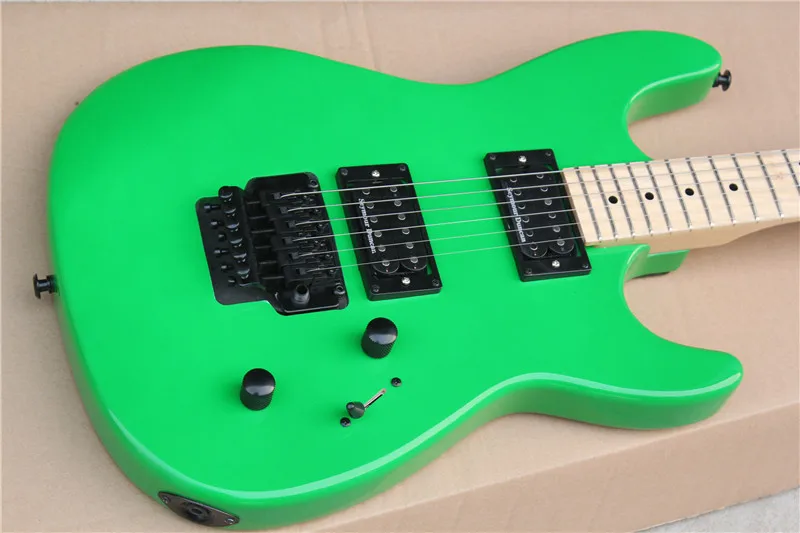 Green electric guitar,basswood body maple neck HH pickups,tremolo bridge, black buttons,,chra guitar