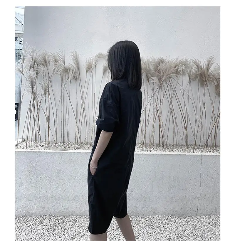 Spring and summer new women's black coveralls hidden clothes door front short sleeve jumpsuit loose cargo pants