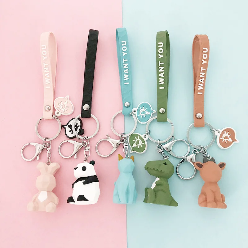 

Creative Gifts Silicone Car Interior Hanging Ornament Geometric Face Animal Keychain Schoolbag Backpack Rabbit Koala Key Chain