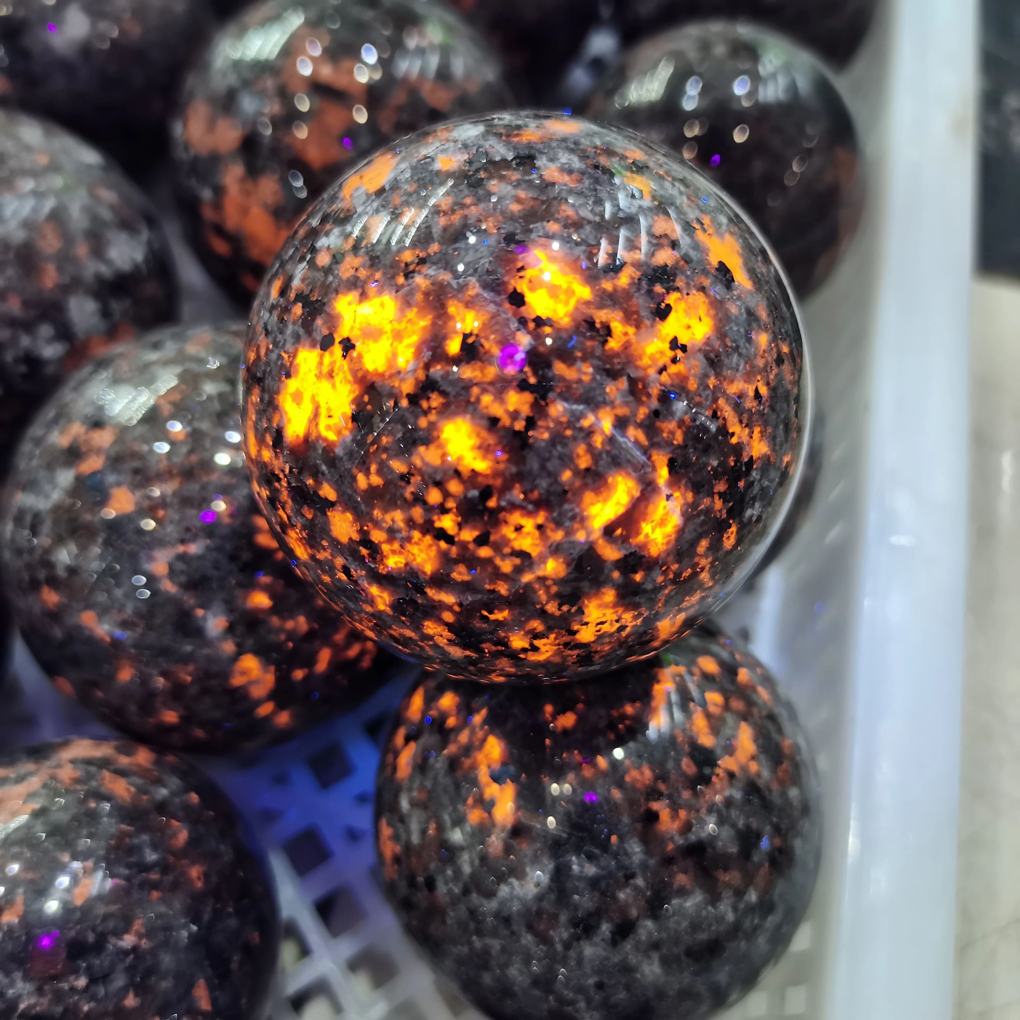 

Natural Magic Flame's Stone Syenite Clasts Containing Fluorescent Sodalite Under Ultraviolet Mineral Ball Gemstones Collections