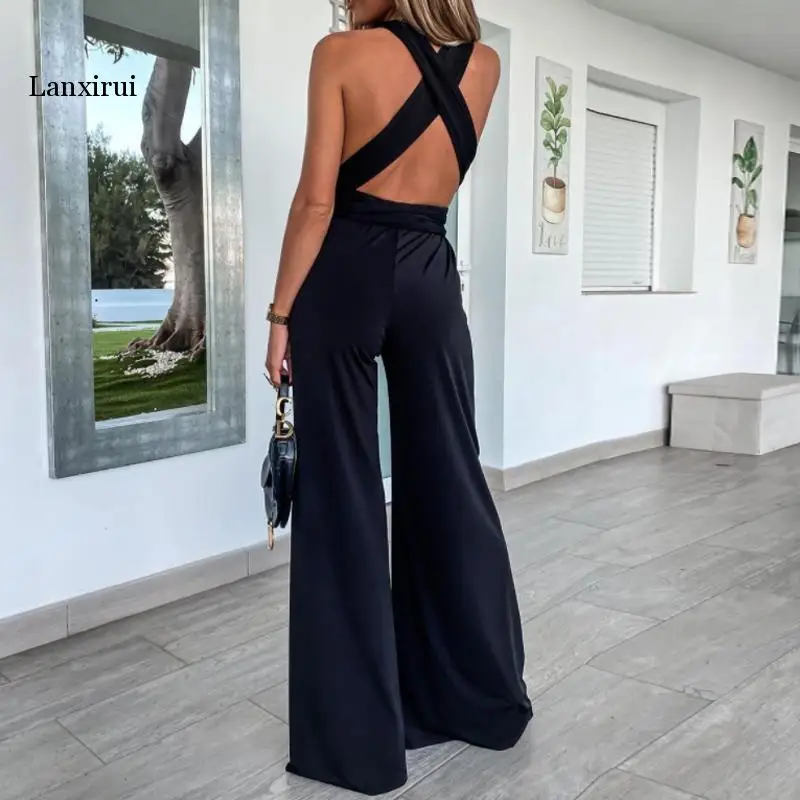 2021 lato elegancki solidna V Neck kombinezon kobiety Sexy bez rękawów kombinezon z odkrytymi plecami moda damska bandaż pas szerokie nogawki Playsuits