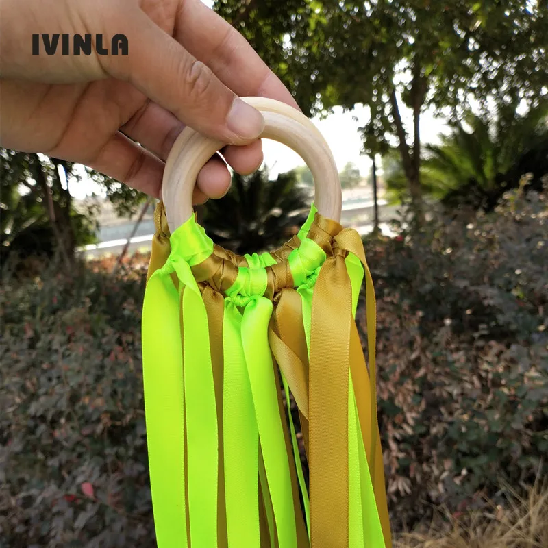 New Arrived gold and green Color Stain ribbon Wooden Ring Waldorf Ribbon With Gold  Bell Hand Kite Toy