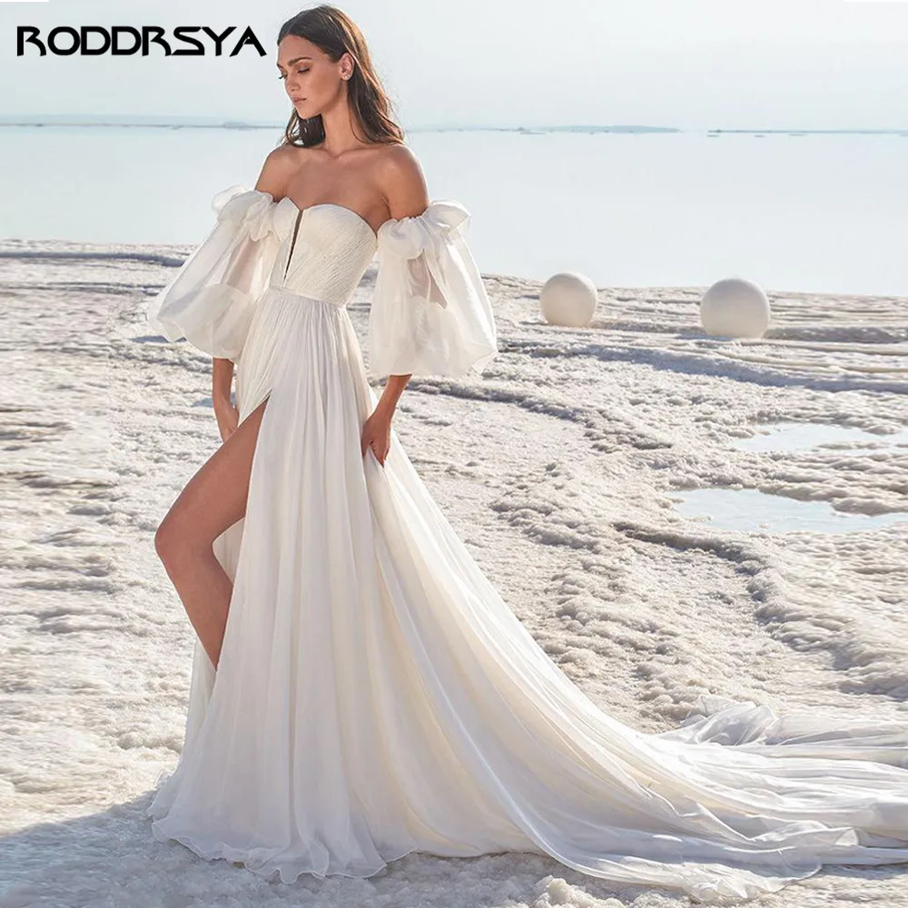 RODDRSYA Boêmia praia de casamento de manga longa e flácida de neve doce vRODDRSYA Boho Vestidos De Casamento Praia Longo Puffy Mangas Chiffon Querida Vestido De Casamento Varrer Trem Custom Made Split Vestido De Noiva