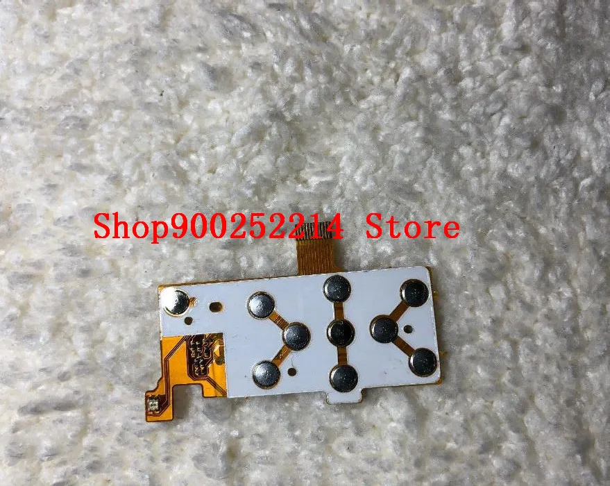 Nuova parte di riparazione della sostituzione della fotocamera digitale per la scheda a nastro del cavo flessibile del pulsante del tasto della tastiera della funzione NIKON S2600