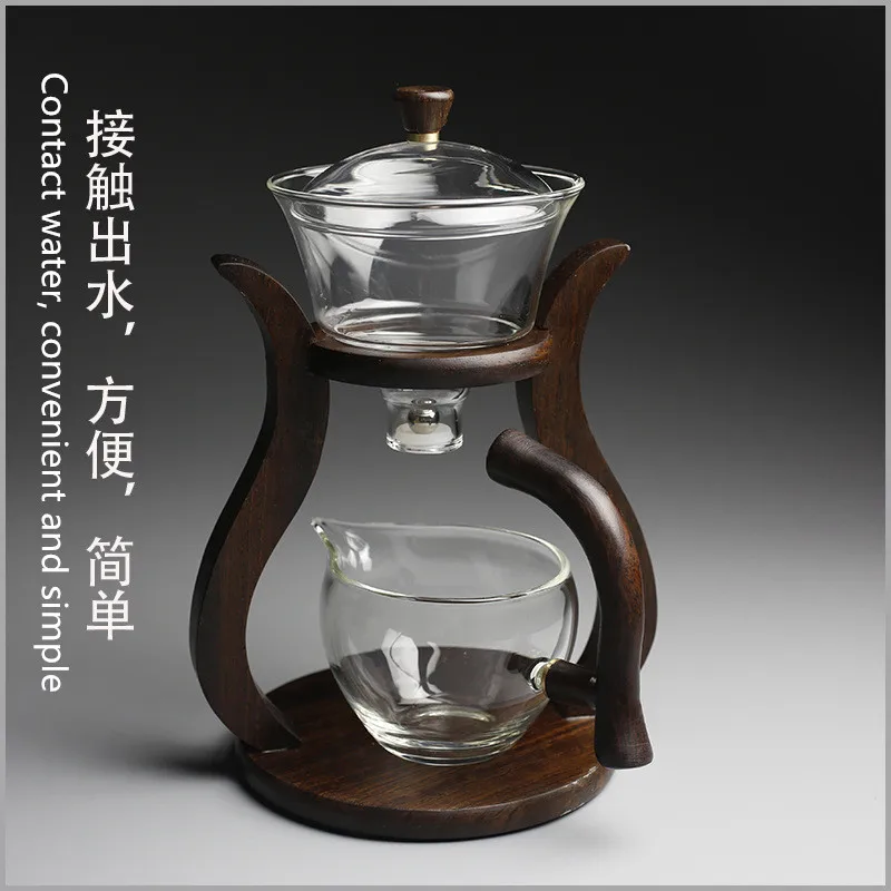 

Heat resistant glass tea set electromagnetic water diversion rotating cover bowl semi automatic teapot lazy teapot Kung Fu Tea