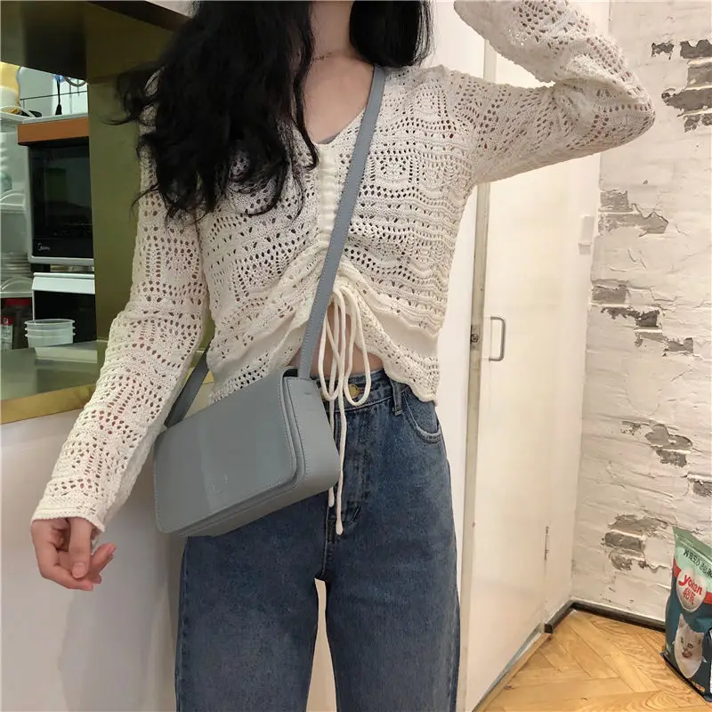 

Newest Sexy Women Pullovers hollow out Tied string designed sweater for girls famale pullover topwear hot selling