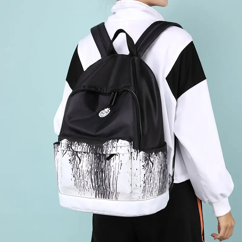 Mochila escolar informal Unisex, bolso ligero de diseñador para adolescentes, niñas y niños, color blanco y negro