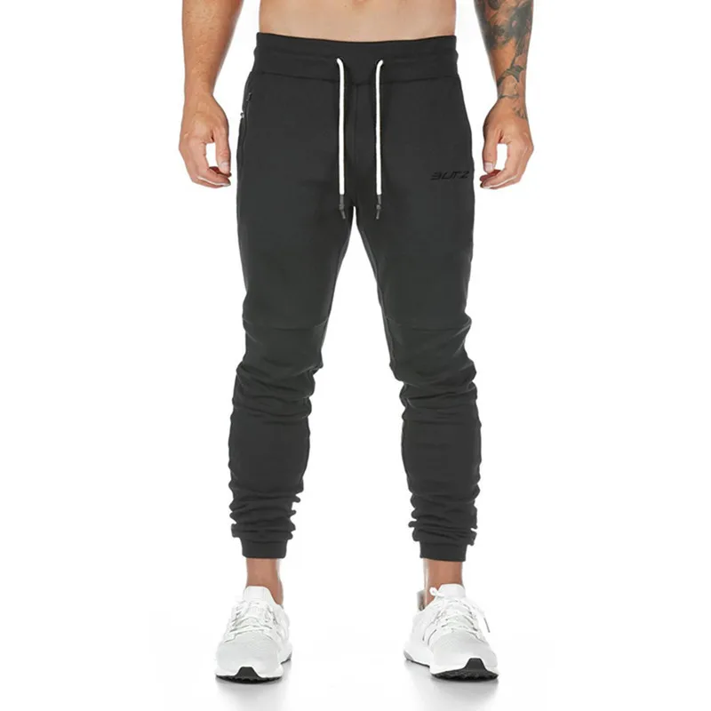 

New Style Muscle Fitness Mens Long Pants Gyms Fitness Sportpants Small Leg Trouser Autumn Personality Zipper Pocket Trousers