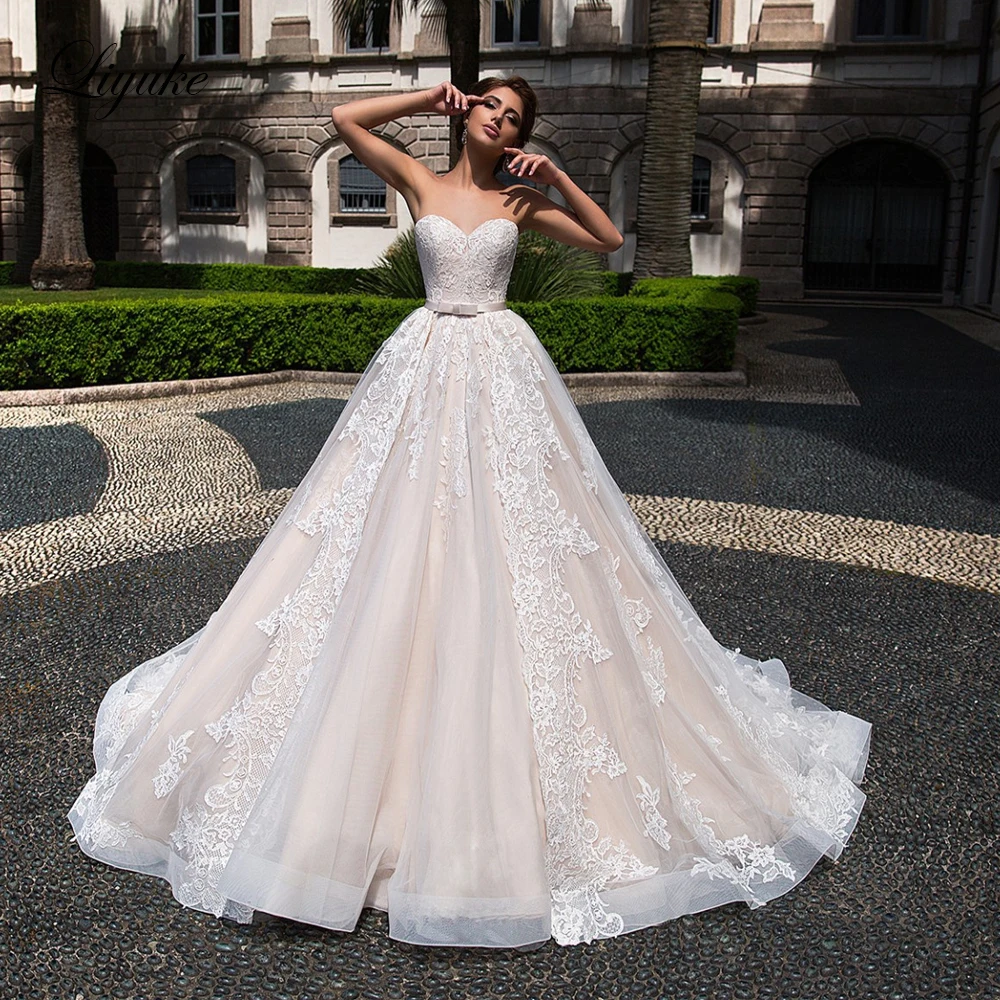 

Liyuke Champagne Lining Of Strapless A Line Wedding Dress With Simple Belt Gorgeous Bridal Gowns