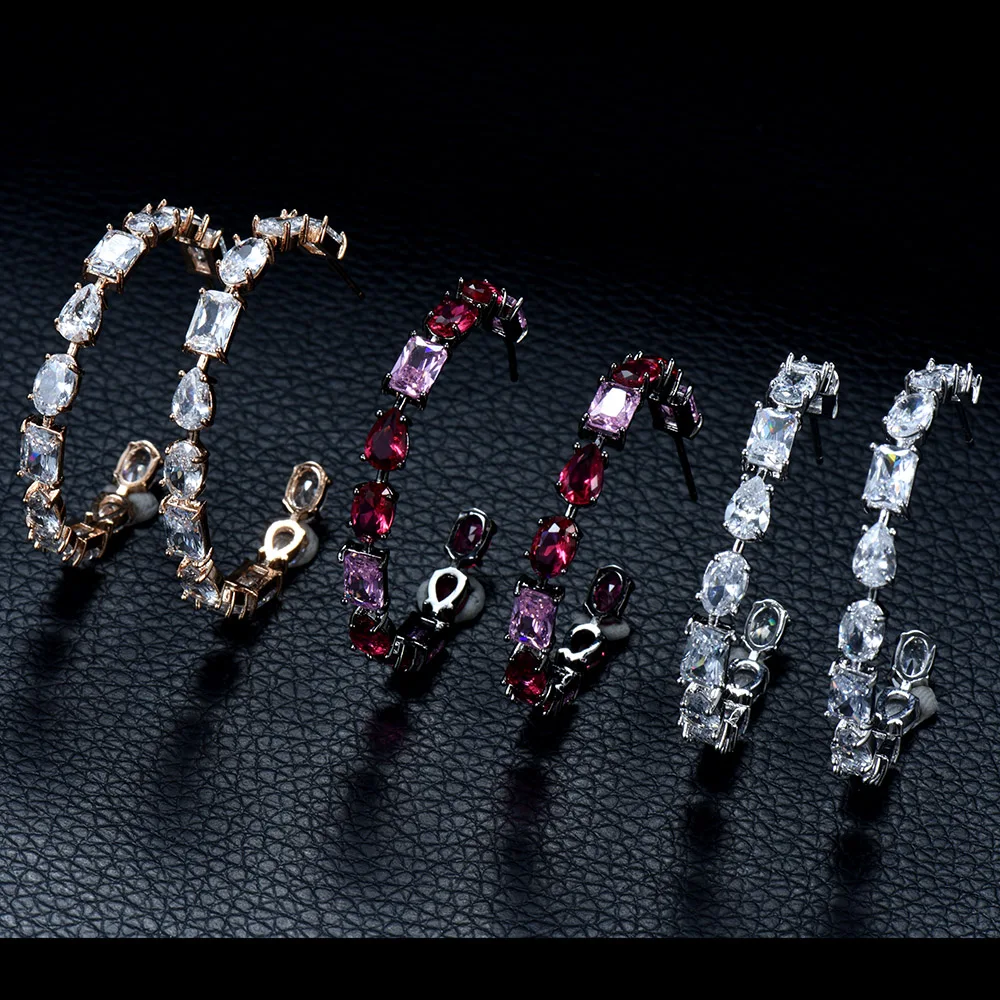 

HIBRIDE Shiny Water Drop Cubic Zirconia Hoop Earrings for Women Trendy Circle Shape Party Show Holiday Shopping Jewelry E-879