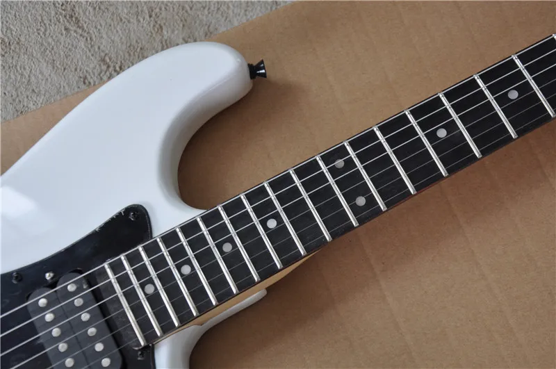 custom star guitar,white basswood body,tremolo bridge,black HH pickups,chrome buttons,electric guitar