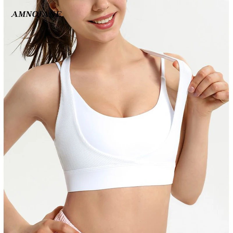 Joga Bralette Running Fitness bez szwu biały stanik sportowy bielizna damska siłownia biustonosze Push-Up kobiety prążkowany piękny tył Tank Top