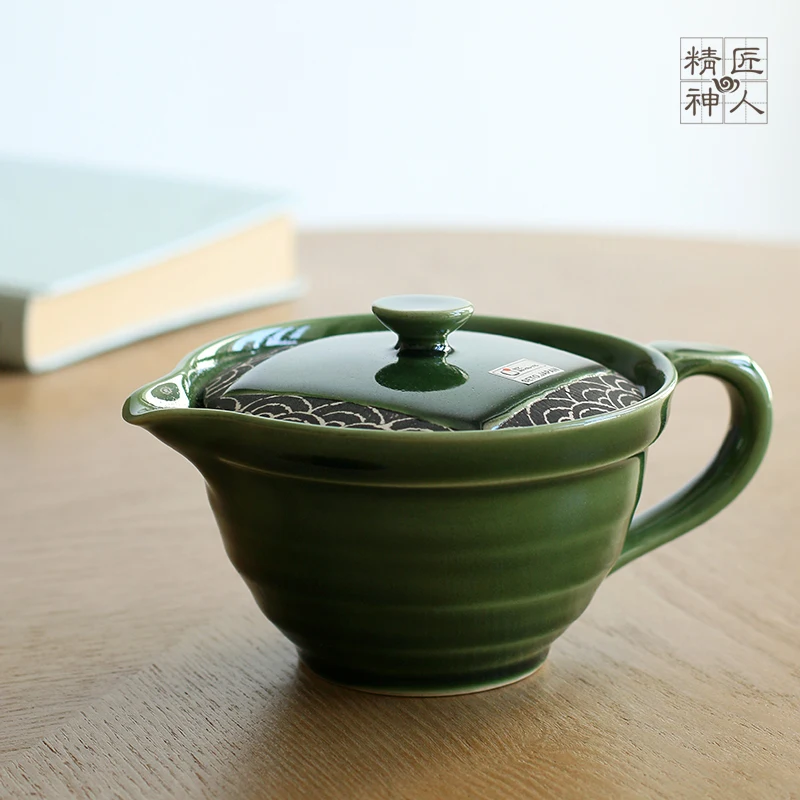 imported from Japan to burn wave bright green glaze ceramic teapot stainless steel mesh for the cause in qinghai teapot