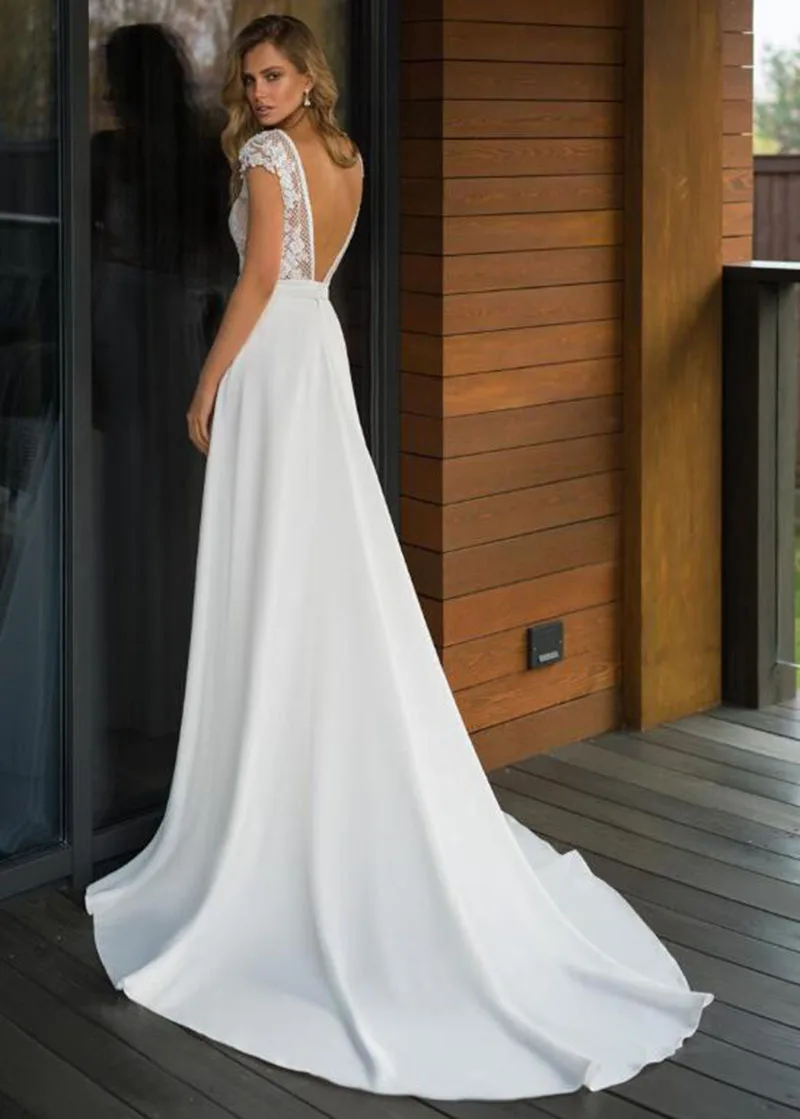 Elegante abito da sposa Boho una linea abito da sposa in pizzo Chiffon estivo Sexy scollo A V profondo Backless Vintage Robe De Mariee su misura