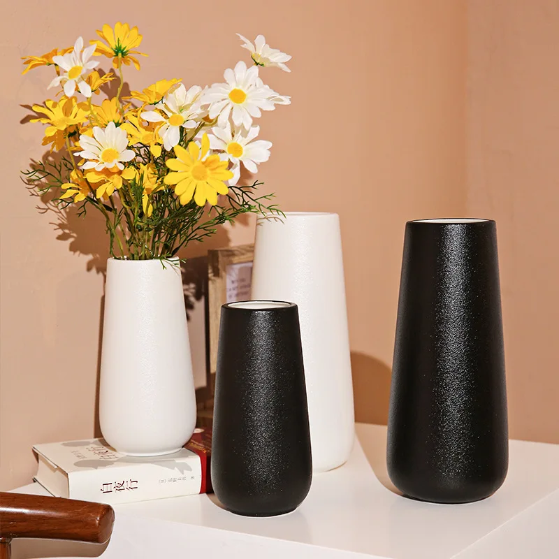 

Simple modern ceramic vase home white vase flower pot ceramic Chinese handicraft home decoration