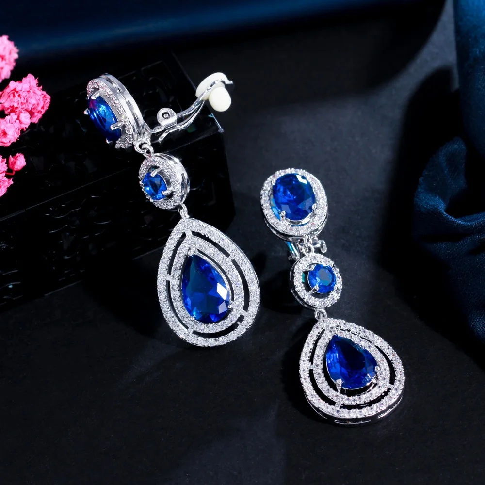 CWWZircons Hochwertige Damen-Ohrringe mit roten Zirkonia-Steinen für Hochzeiten, Partys und Kostüme, lange Tropfenform, zum Anklipsen, ohne Ohrloch, EJ0017 – Detail 6