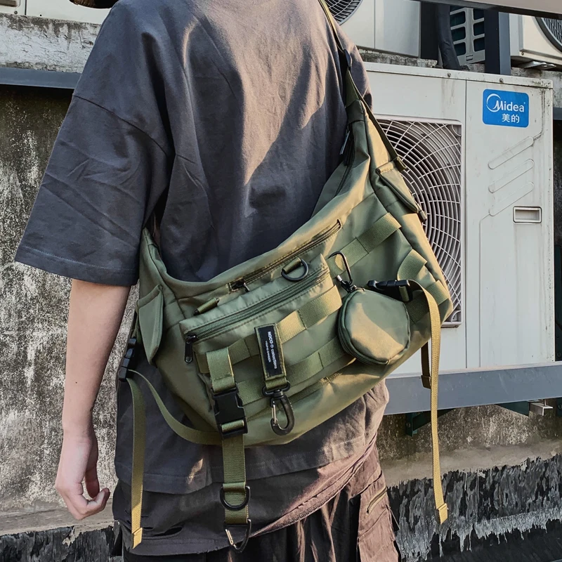 Bolso cruzado de hombro para hombre y mujer, bolsa funcional Harajuku de marca de moda, negocios de moda, bolso de trabajo de viento oscuro para