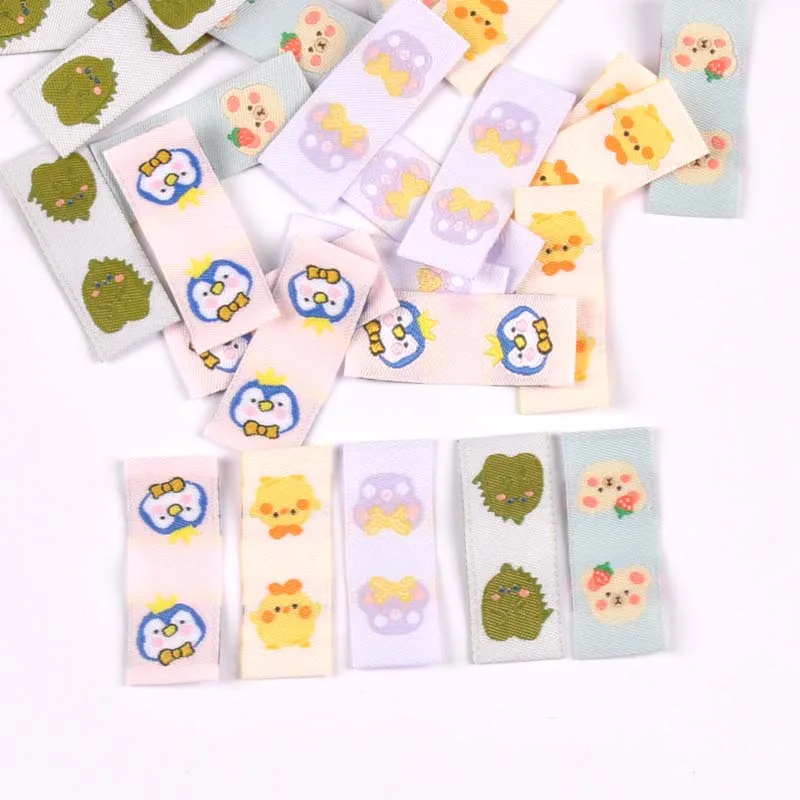 50Pcs Cartoon Dinosaur/Penguin Labels For Shoes Care Bags Sewing Garment Handmade Accessories DIY Crafts Fabric Clothing Tags