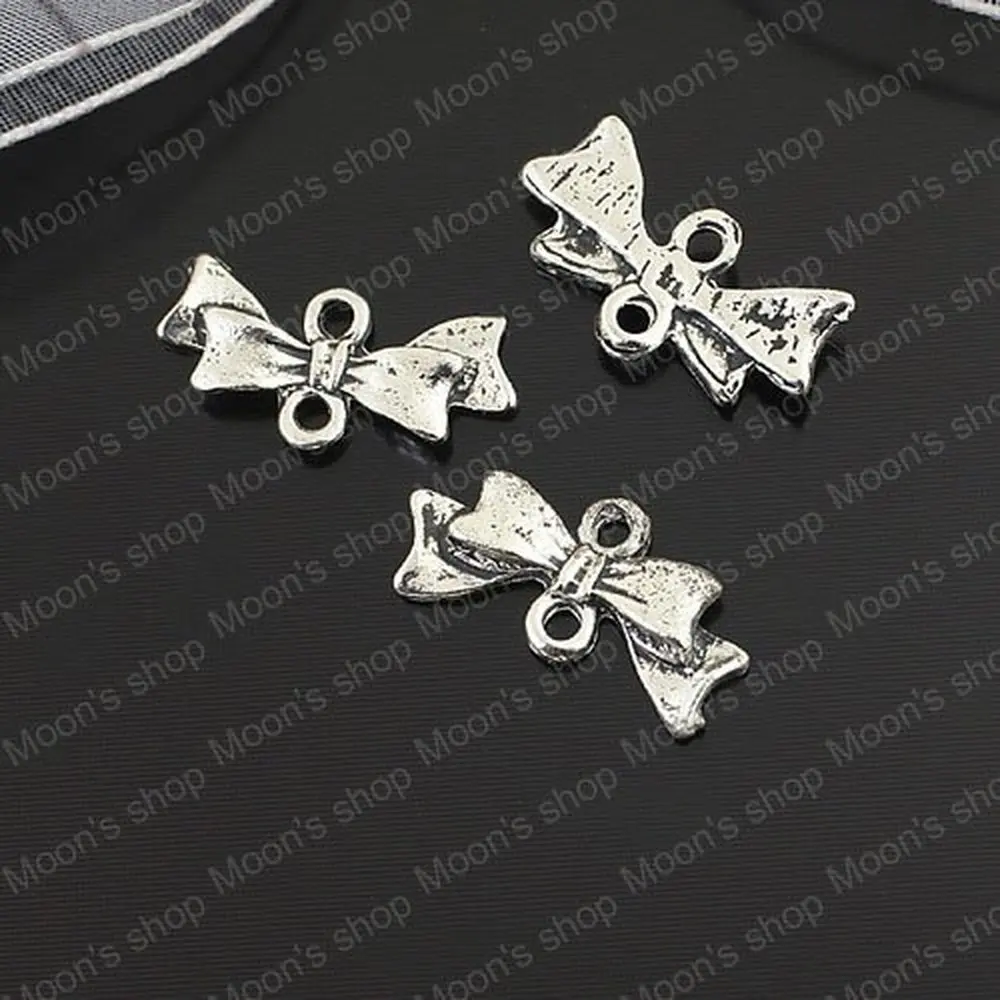 

Wholesale 20*8mm Antique Silver color Bow Alloy Two Holes Connectors Diy Findings Accessories 50 pieces(JM2271)