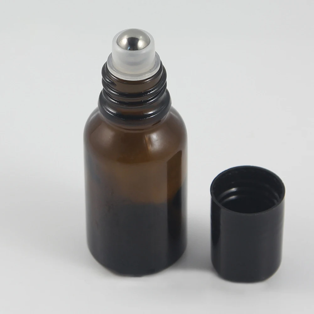 

Wholesale glass roll on bottle with stainless steel roller ball or glass roller ball 15ml amber glass lotion bottle