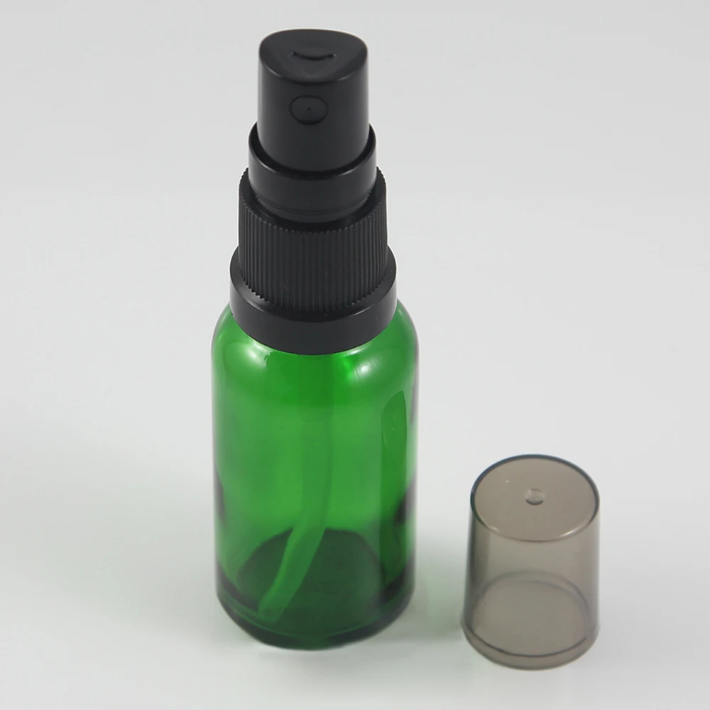 Wholesale glass bottles 20ml green bottle, mini travel refillable perfume atomizer with black pump