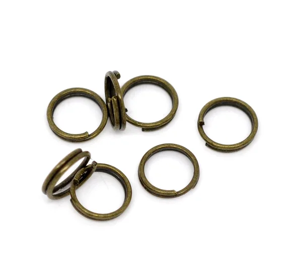 

Lovely 1000 Bronze Tone Split Jump Rings Findings 7x1.2mm (B09776)