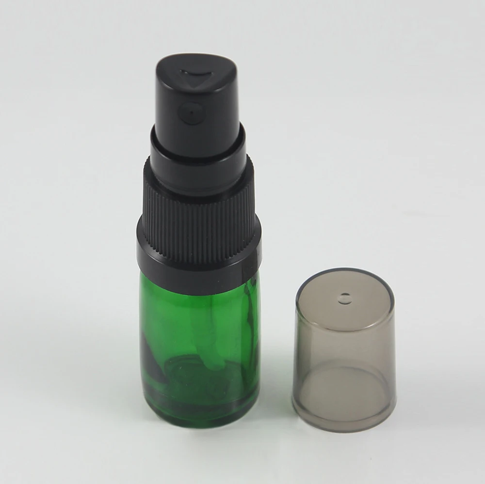 

China factory 5ml Green pressed bottle empty small sample cosmetic cosmetic mist spray glass bottle with pump