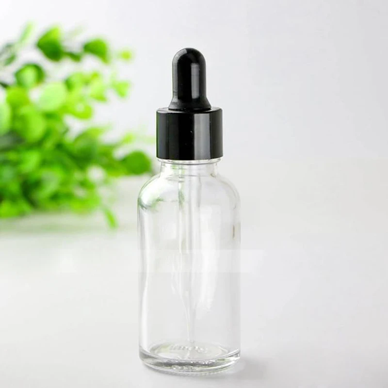 

30ml Empty Clear Glass Dropper Bottle 1 oz Cosmetic Liquid Oil Bottle With Gold Black Silver Cap And Glass Dropper