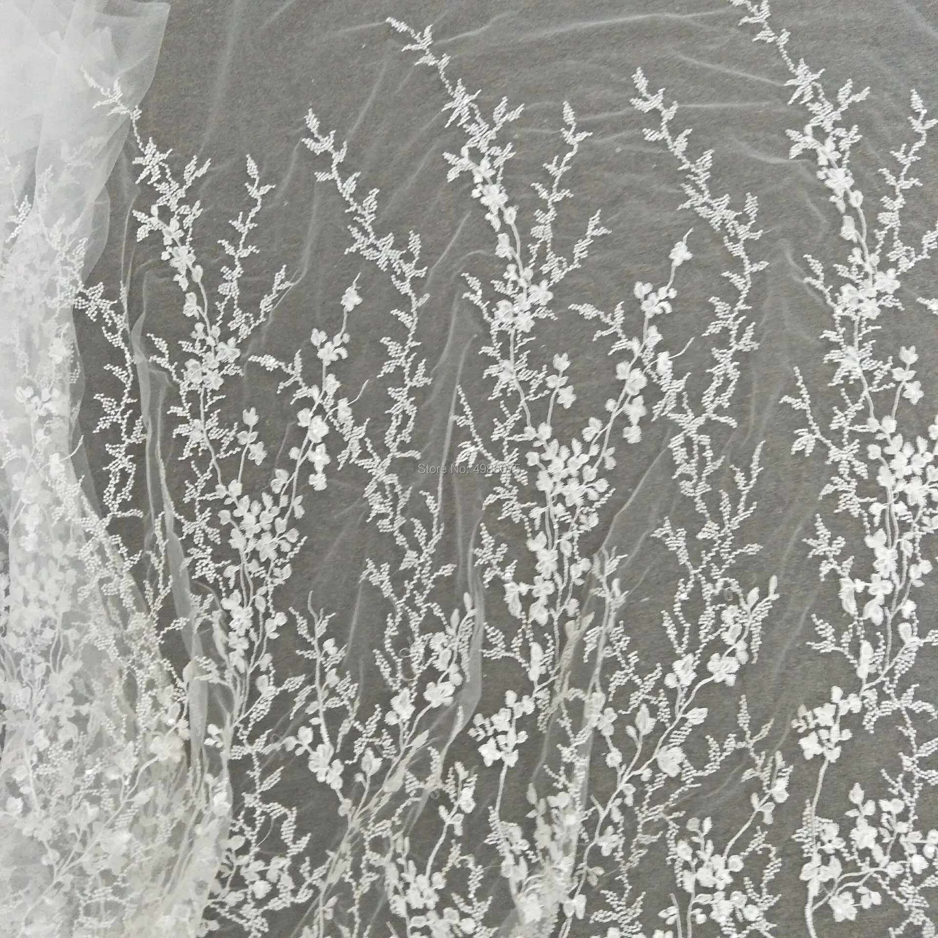 Fashionable ivory lace fabric tulle lace fabric bridal lace fabric with sequins sell by yard