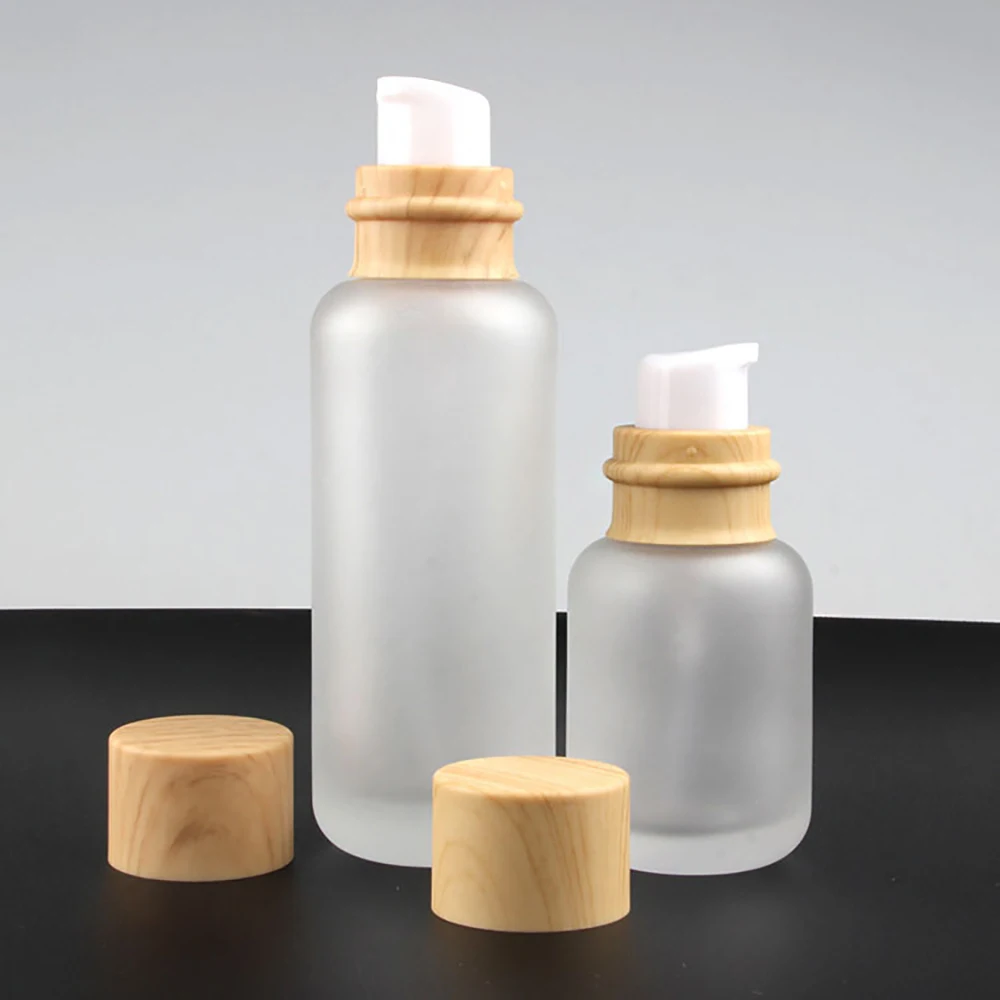 Clear Frosted with wooden lid personal care packaging 150ml toner customized glass bottle manufacturer