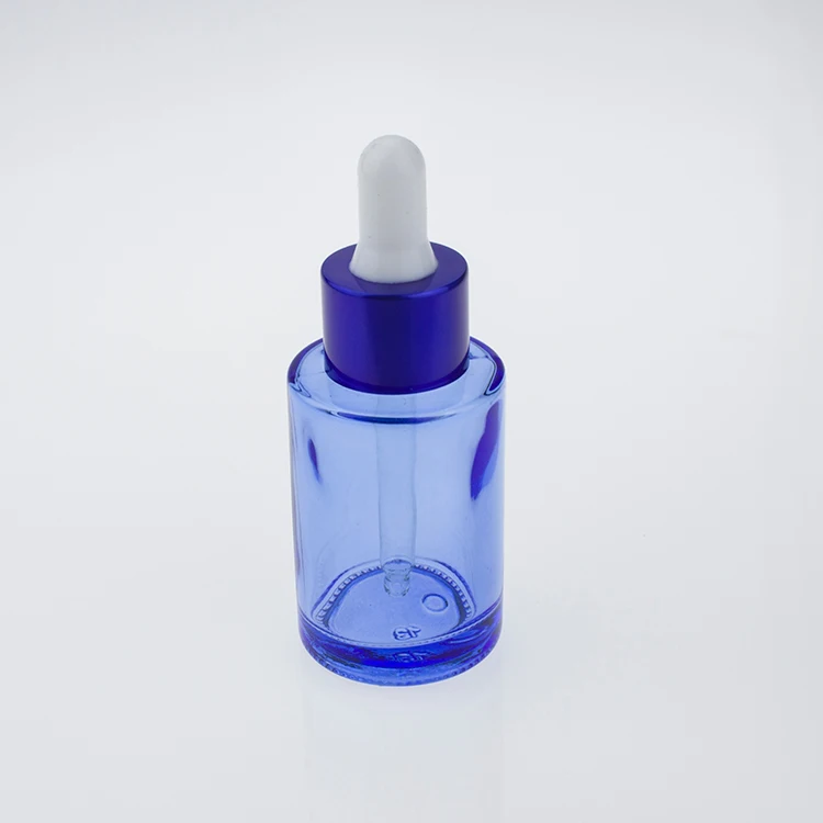 

Blue Glass bottle with shiny blue collar and white rubber essential oil bottle 30ml in stock