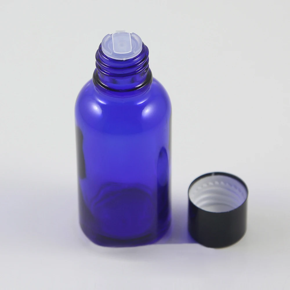 Empty bottles with stoppers 1 oz, 30ml blue glass bottle with black lids cosmetic packaging