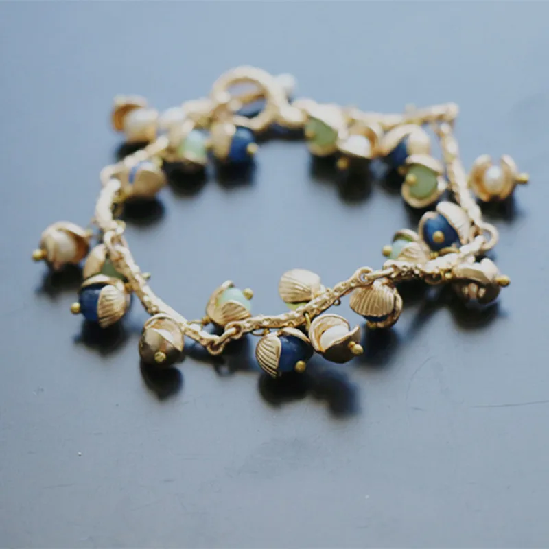 Free shipping  copper gole plated natural pearls    fashion  gold shell  bracelet