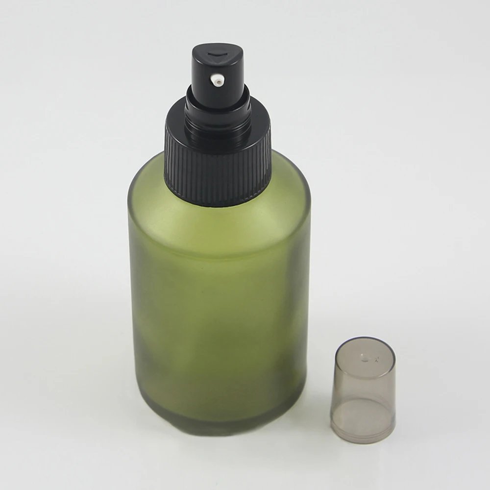 

empty 125ml round light green frosted lotion bottle with black pump,125 ml glass cosmetic packaging for liquid cream and lotion