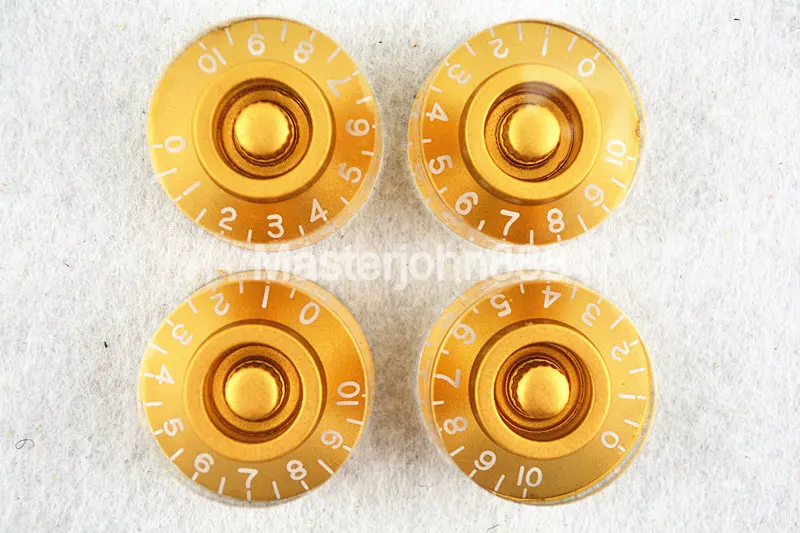 1 Set of 4pcs Gold Electric Guitar Control Knobs Flying Saucer Speed Volume Tone Knobs For LP SG Electric Guitar