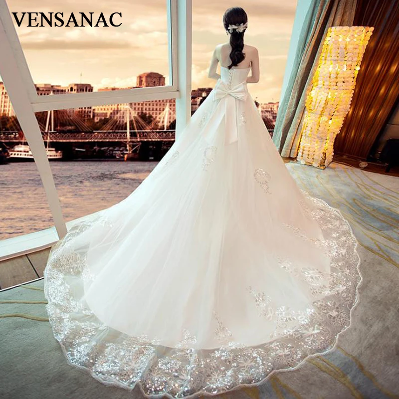 

VENSANAC Ball Gown Lace Appliques Strapless Wedding Dresses Sequined Court Train Bow Backless Bridal Gowns