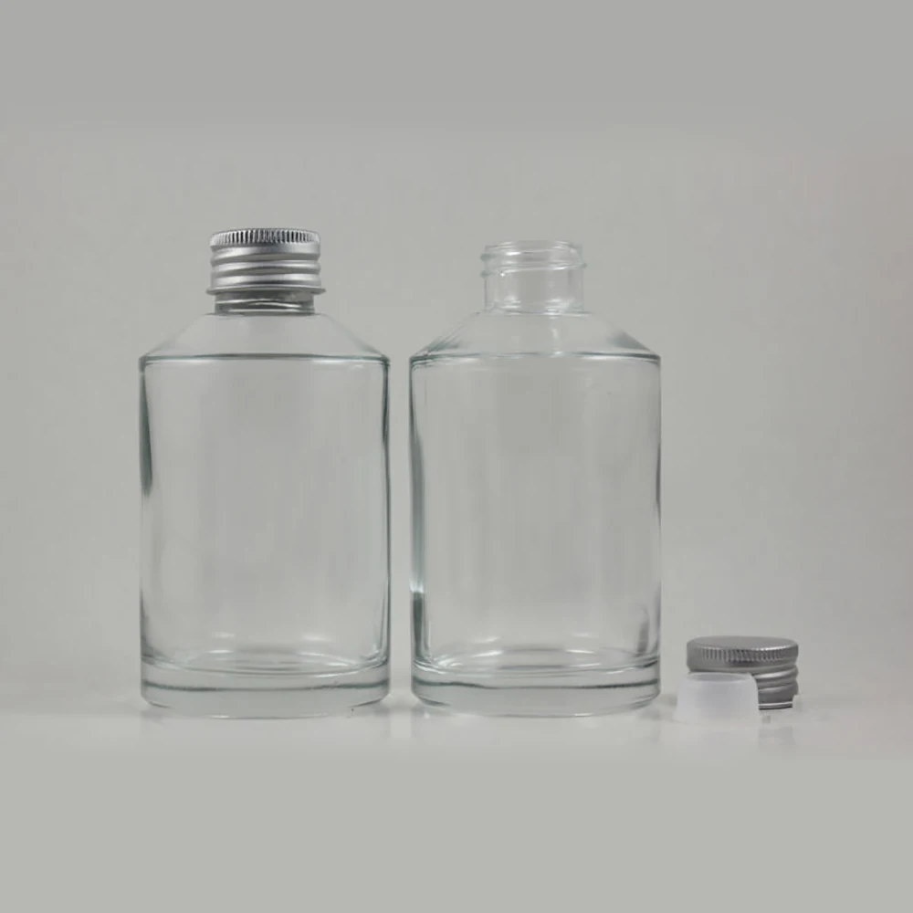 

20pcs 200ml round clear lotion bottle with silver screw cap and clear reducer, 200 ml glass cosmetic packing for liquid cream