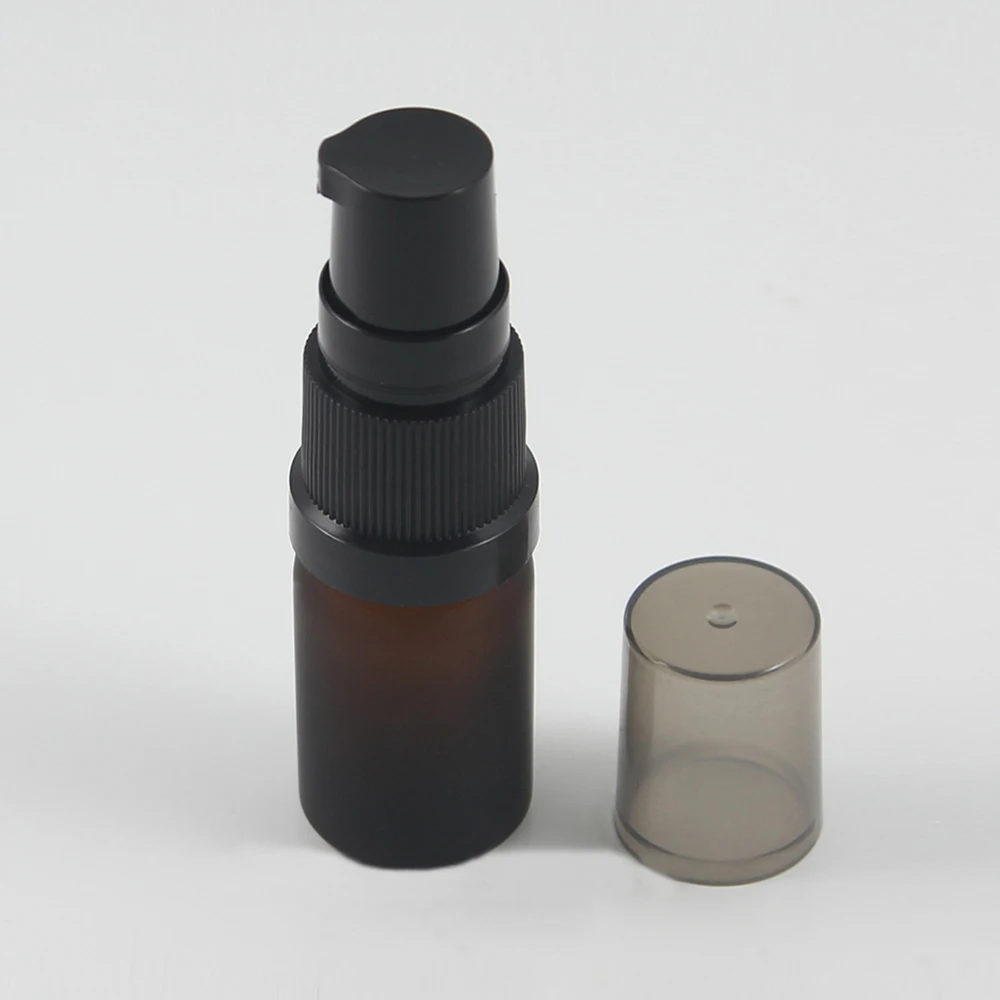 

wholesale refillable bottle 5ml sample portable lotion bottle with pump, frosted amber 5ml essential oil cosmetic container