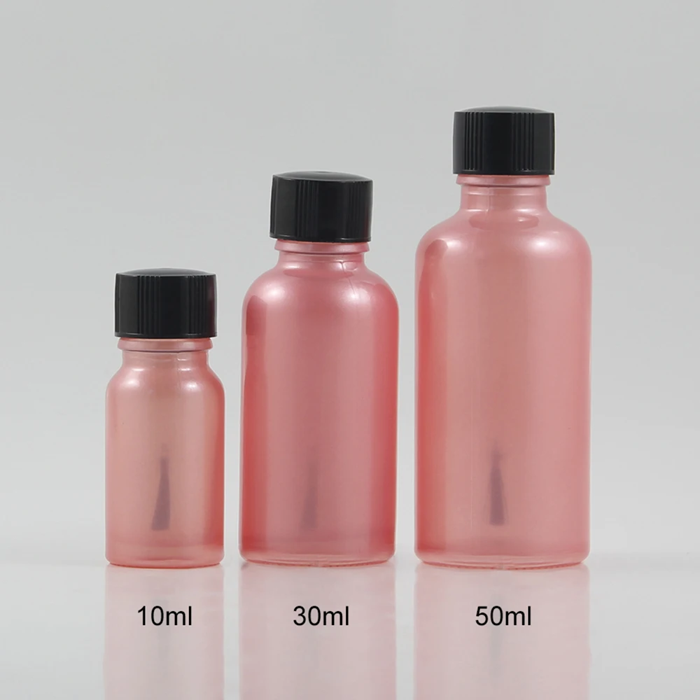 

China suppliers 100pcs 30ml Cosmetic Round Nail Oil Glass Bottles Containers Glass Nail Polish Bottle With A Lid Brush