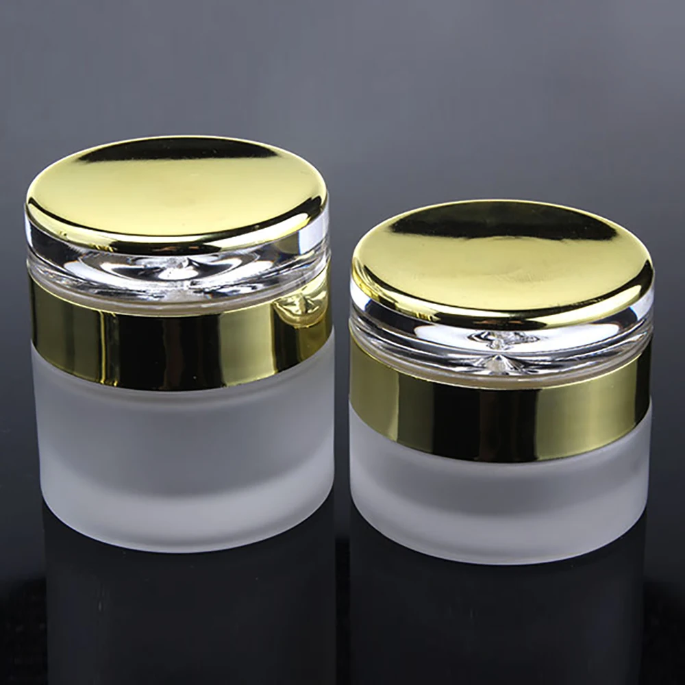 

China supplier clear frosted glass jar 1oz, empty round glass jar with gold cap glass cosmetic cream container