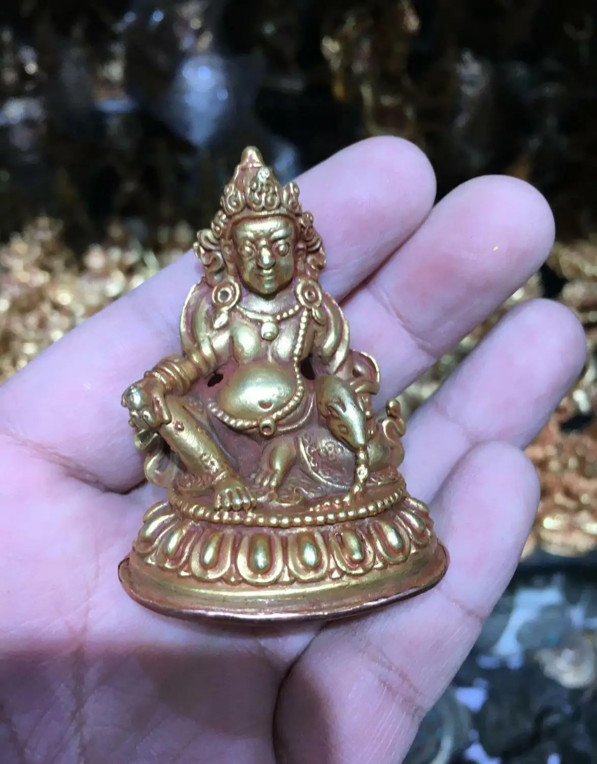 

Nepal tibet bronze gold carved small buddhism buddha Yellow Jambhala statue