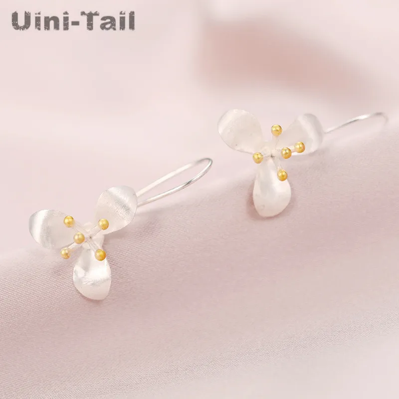 Uini-Tail hot new 925 Tibetan silver Thai craft clover gold flower earrings fashion tide flow high quality earrings GN953