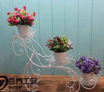 European-style balcony and indoor living room three layer shelf floor a few flowerpot wearing flower gardening