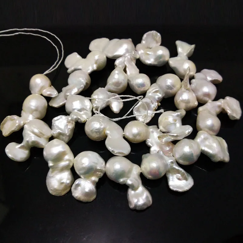 

16 inches 12-30mm White Fish Shaped Good Luster Natural Baroque Pearl Loose Strand