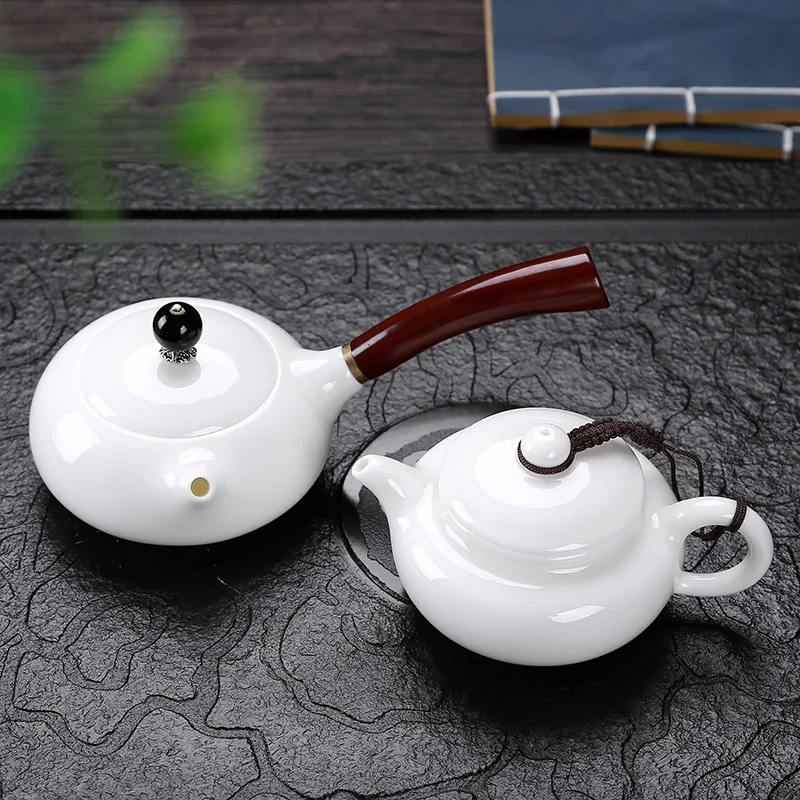 

Dehua suet jade white porcelain Chinese household solid wood side teapot handmade teapot health