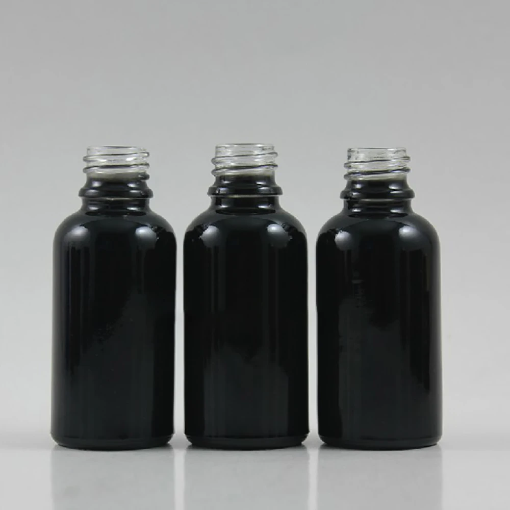 

wholesale 100pcs glass 30ml shiny black empty bottle without any caps,could match with sprayer / pump or dropper