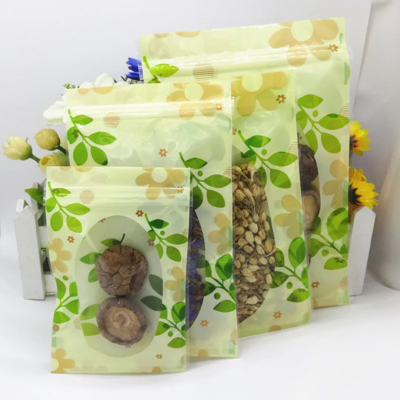 

14*20cm 5.51"x7.87" 600Pcs/Lot Green Leaf Zip Lock Bags Dried Flower Tea Biscuit Heat Seal Clear Poly Valve Packaging Bag